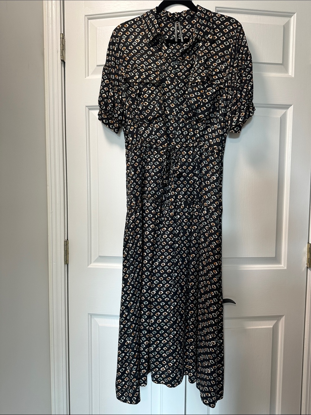 Anthropologie Utility Pocket shirt dress in midi length.